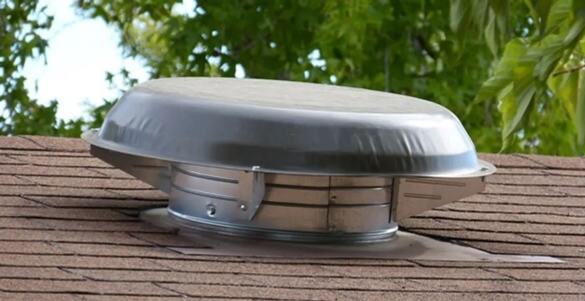 attic fan installation services with low-profile roof ventilation unit in Detroit, MI