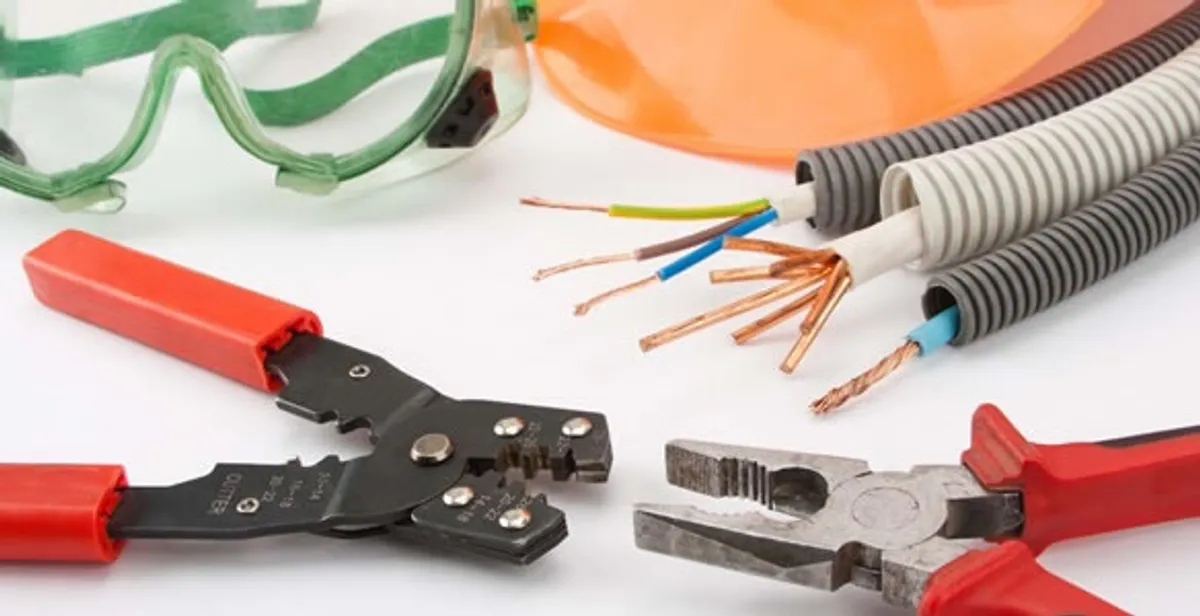 Electrical wiring repair with professional tools and safety equipment in Highland Park, MI