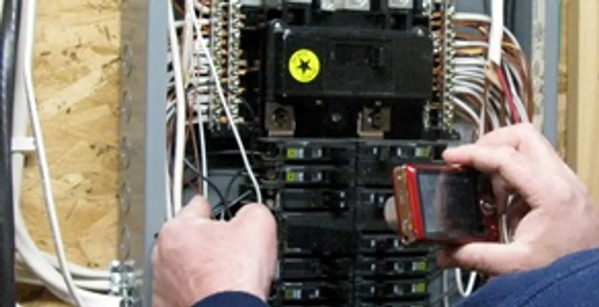 Home electrical inspection of circuit breaker panel by licensed electrician in Detroit, MI