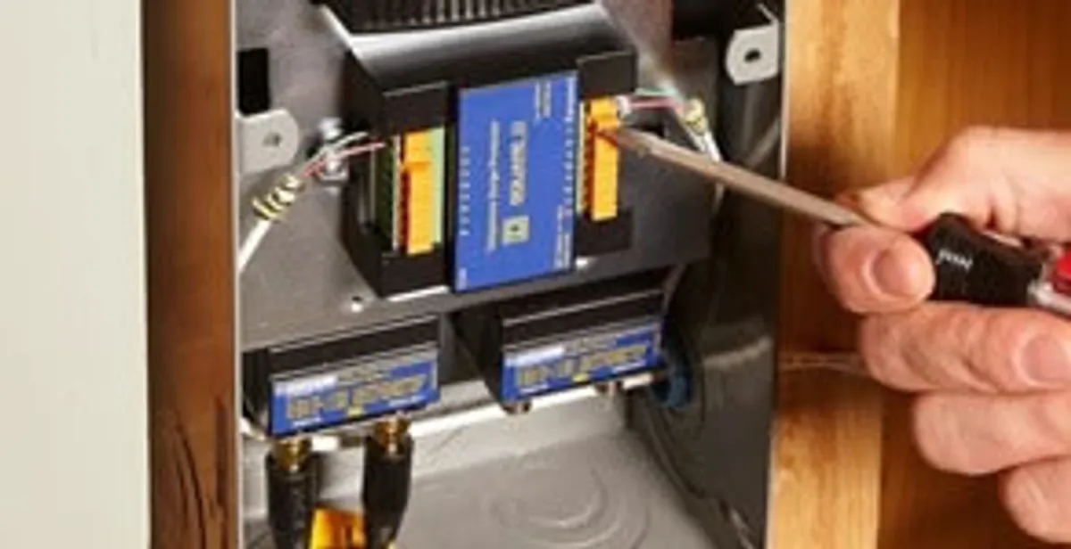 Whole home surge protection device being installed by a licensed electrician to protect electrical systems in Detroit, MI